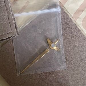 Awe inspired flying dagger stud single earring gold vermeil moonstone